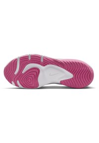 Bílá a růžová podrážka tenisky Nike se zvlněným vzorem a malým logem Nike swoosh uprostřed.