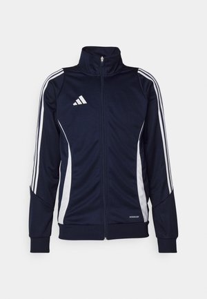 Navy athletic jacket made of smooth fabric, featuring white stripes on sleeves and a high collar. Logo on chest, zipper closure at front.