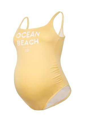 Gelber Schwimmanzug für Schwangere mit solidem Design, featuring weißen Text "OCEAN BEACH" und "seit 2008," Spaghettiträgern und seitlicher Raffung.