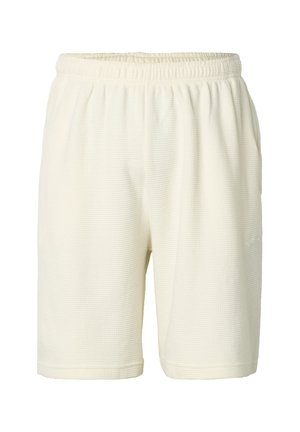 Kremowe szorty z fakturowanej tkaniny z elastycznym stanem, długość do kolan, z dyskretnym logo po boku.