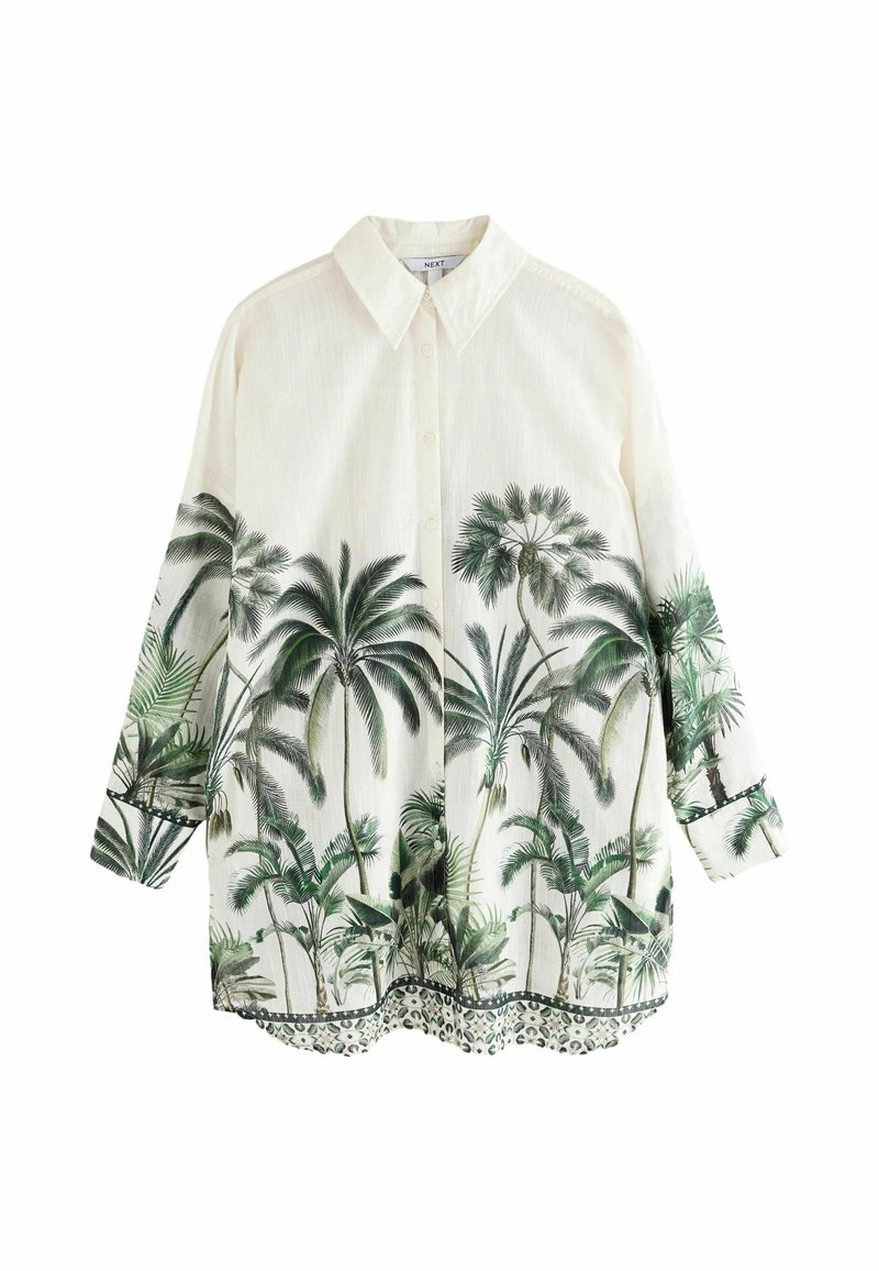 Witte shirt met palmboom- en bladprint, met kraag, lange mouwen, met een gegolfde zoom en groene accenten bij de manchetten en onderkant.