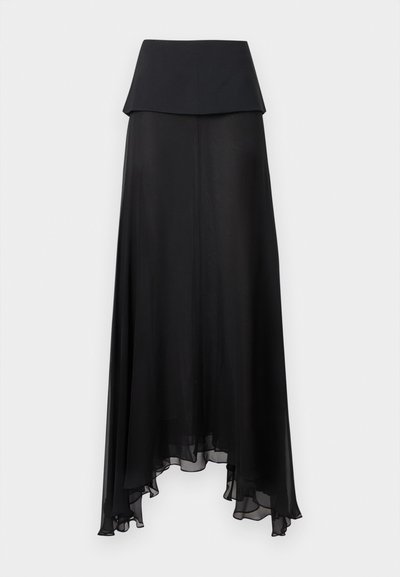 Sort maxinederdel med høj talje, lagdelt taljebånd og asymmetrisk, gennemsigtigt skørt med bløde flæser.