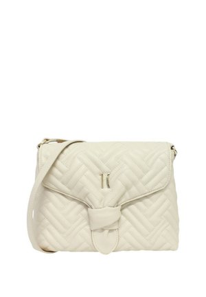 Borsa a tracolla trapuntata color crema con motivo a chevron, dettaglio nodo frontale e sottile tracolla regolabile.