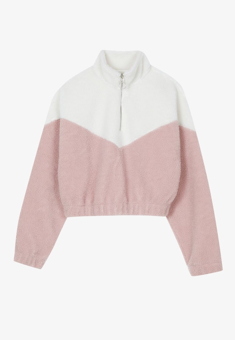Pull-over en polaire coupé avec bloc de couleur rose et blanc, col montant, manches longues et demi-fermeture éclair avec tirette ronde.