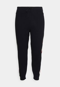 Schwarze Sweatpants mit elastischem Bund und Kordelzug. Mit seitlichen Streifen in Rot und Weiß. Eng anliegende Bündchen. Weiches, strukturiertes Gewebe.