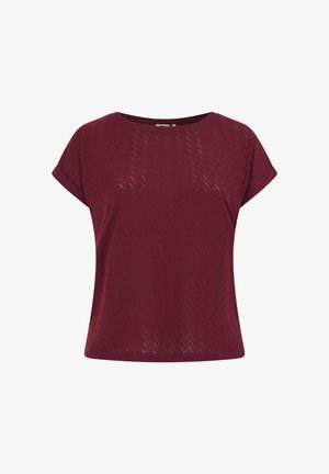 Bordowa bluzka z krótkim rękawem o fakturze w jodełkę, z okrągłym dekoltem i luźnym krojem. Wykonana z lekkiego materiału.