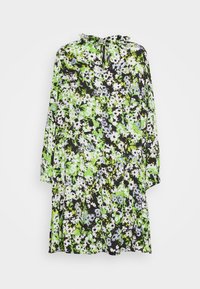 Floral dress featuring a ruffled neckline with a keyhole detail, made of lightweight fabric. Dominant colors include green, black, and white.