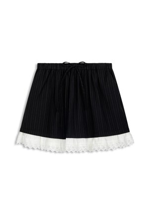 Gonna a righe nere con vita arricciata e fiocco, rifinita con pizzo bianco sull'orlo.