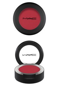 Compact de blush rond MAC avec un intérieur en poudre rouge texturé et un extérieur noir mat. Comprend un couvercle transparent et un bord en argent.