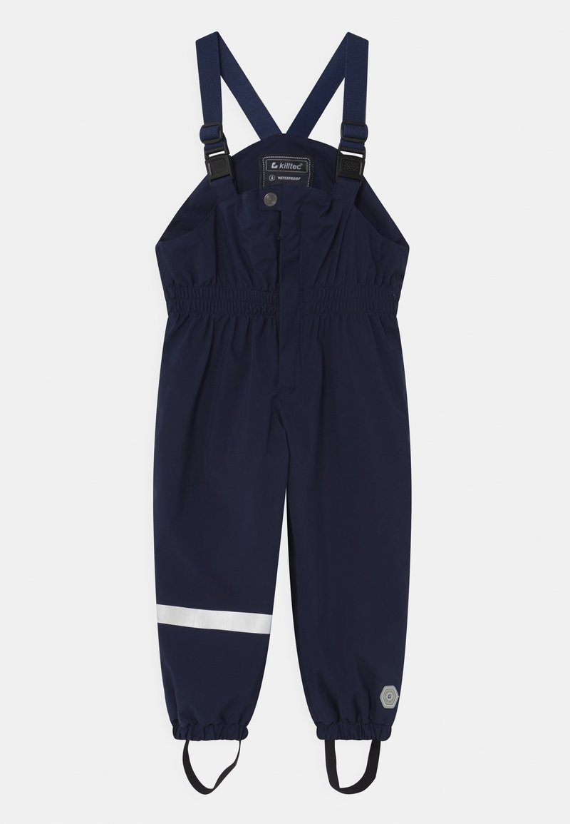 Combinaison imperméable pour enfants bleu marine avec bretelles réglables, taille et chevilles élastiques, bande réfléchissante sur une jambe et sangles pour les pieds.