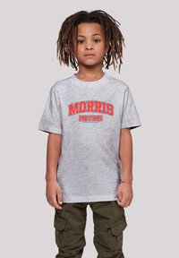 Gray short-sleeve t-shirt with "MORRIS MOTORS" in red and black text; paired with olive green cargo pants, smooth fabric texture.
