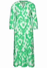 Grünes schichtetes Kleid mit V-Ausschnitt, langen Ärmeln und einem abstrakten Muster in verschiedenen Grüntönen und Weiß. Hergestellt aus leichtem Stoff.