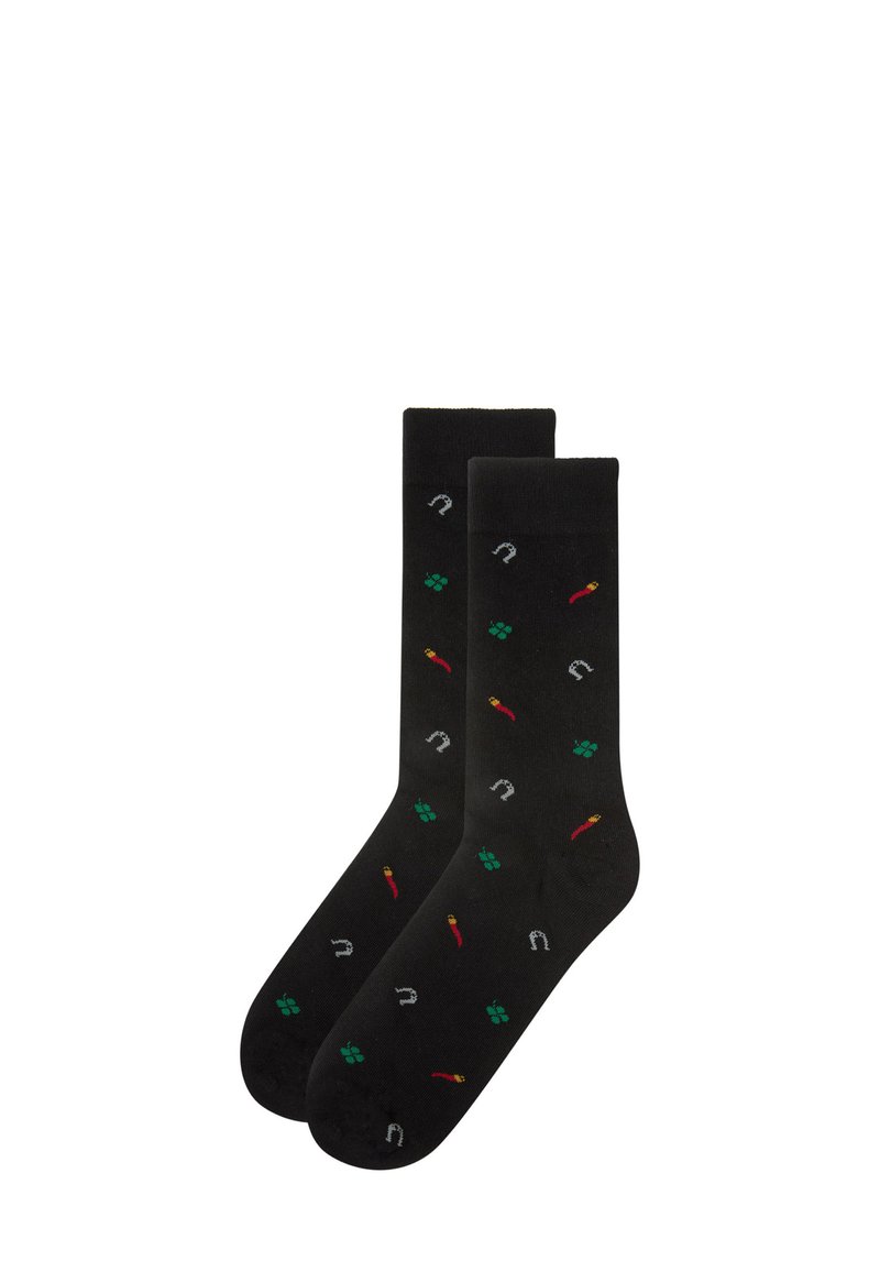 Black socks featuring a pattern of red chili peppers, green shamrocks, and silver horseshoes. Smooth texture and standard crew shape.