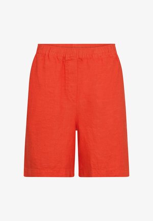 Svijetlo narančaste kratke hlače s elastičnim strukom, jednostavnog dizajna, dužine do sredine bedra, bez vidljivih džepova ili ukrasa.