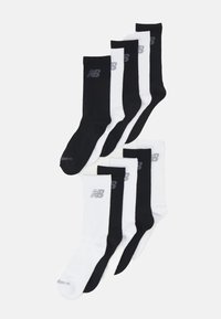 Cotton athletic socks in black and white, featuring a logo on the top. Each pair has a ribbed cuff and a smooth texture.
