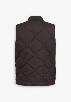 Gilet trapuntato scuro caratterizzato da un motivo a onde, con colletto alto e senza maniche. Realizzato in tessuto liscio e leggero.