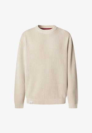 Beige knitted crewneck sweater with long sleeves and ribbed cuffs and hem, featuring a small white fabric label near the hem.