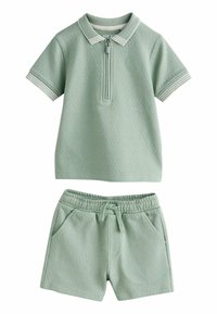 Nevybrané, sage green zip neck