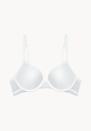 Sottoveste bianca imbottita con coppe lisce, spalline regolabili e pannelli laterali in pizzo. Presenta un design senza cuciture e una chiusura a gancio e asola sul retro.