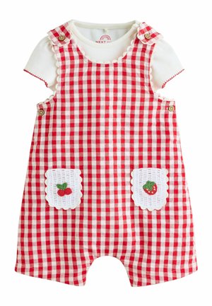 Red and white checkered baby romper with button straps and white pockets embroidered with cherry and strawberry over a white short-sleeve shirt.
