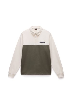 Långärmad polo som har en krämfärgad övre del och en olivgrön undre del, tillverkad av mjukt tyg med en logotypapplikation på bröstet.
