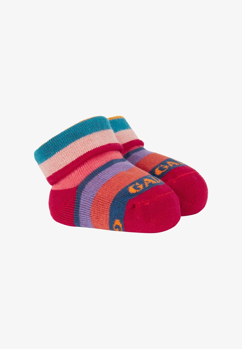 Calzini per bambini a strisce in rosso, rosa, lavanda e turchese. Presentano un polsino a coste e lettering giallo del marchio sulla suola. Materiale morbido e elastico in maglia.