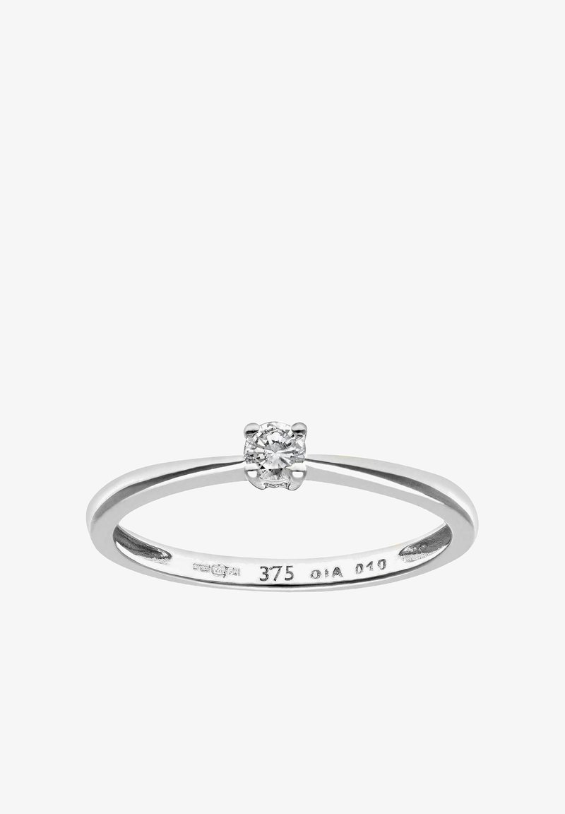 Viengla su vienu deimantu, pagaminta iš baltos aukso, su apvalaus pjūvio deimantu paprastoje keturių galiukų fiksacijoje, turinti lygią, poliruotą juostą.