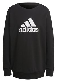 Sudadera negra con escote redondo, mangas largas y puños acanalados. Presenta un logo blanco de Adidas en el pecho. Está hecha de una tela suave.