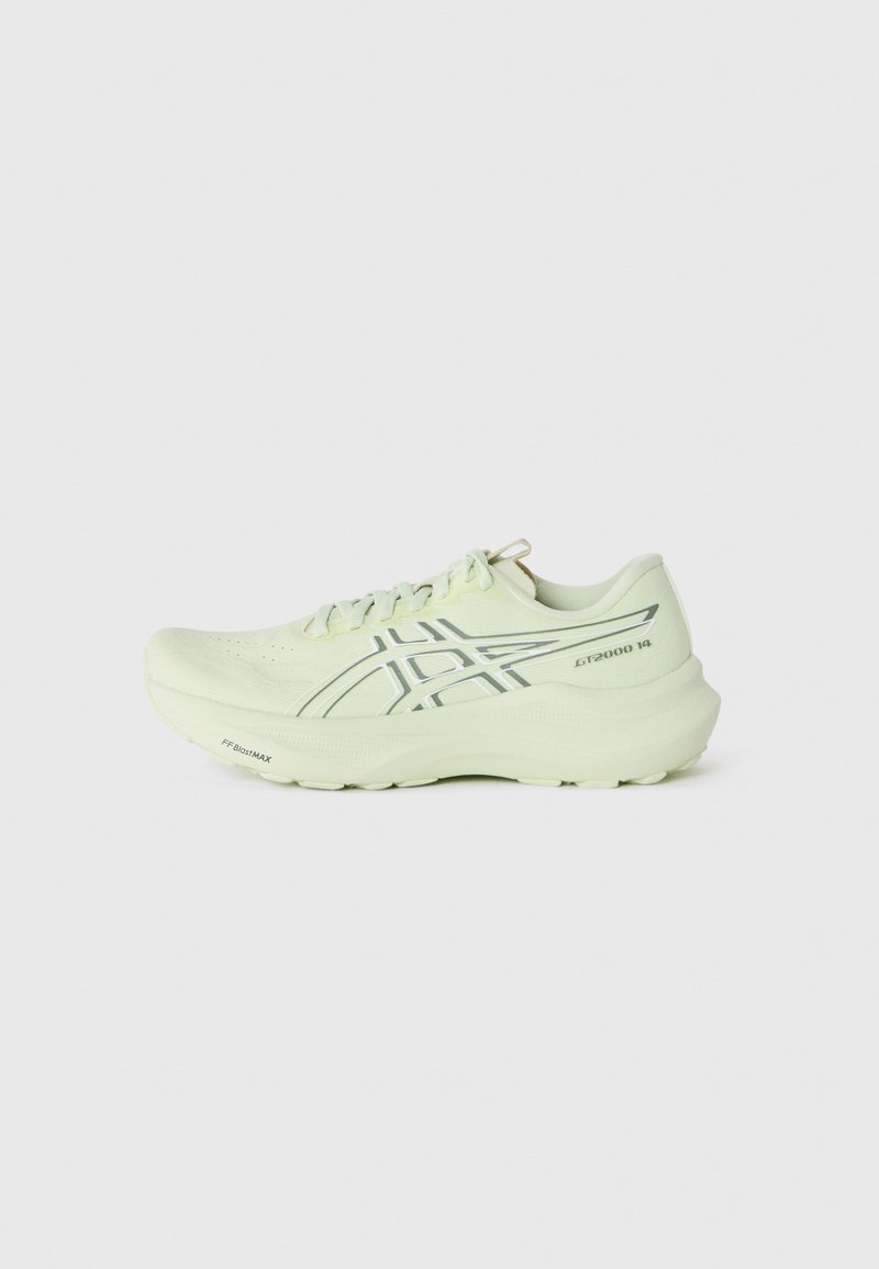 Light green running shoe with a textured upper, padded collar, and reflective accents. Features a thick outsole and perforated detailing.