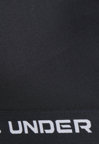 Under Armour CROSSBACK MID BRA - Športni modrček s srednjo podporo - black/white