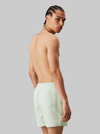 Calvin Klein Swimwear MEDIUM DRAWSTRING - Kopalne hlače - pastel green