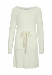 Pletena haljina u boji slonovače s okruglim izrezom, dugim rukavima, pojasom u struku i dva prednja džepa. Teksturirana tkanina i meki završetak.