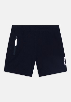 Marineblå shorts laget av lett materiale med elastisk midjebånd, med en glidelåslomme og en hvit logo på forsiden til høyre.