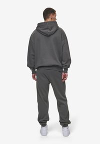 Pegador LOGO JOGGER - Pantalones deportivos - washed anthracite