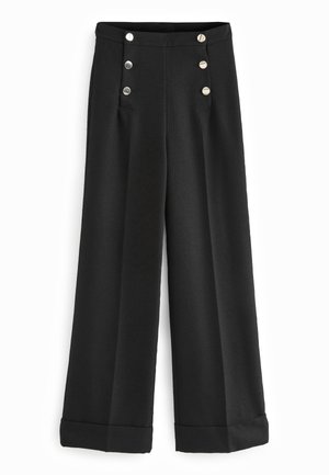 Schwarze, hoch taillierte, weite Hose mit umgeschlagenen Säumen und zwei Reihen mit je drei Metallknöpfen am vorderen Bund.