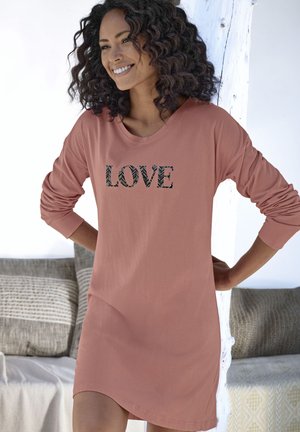 Long-sleeve, coral-colored dress made of soft fabric featuring the word "LOVE" in a patterned design across the chest.
