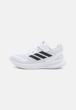 White athletic shoe with a breathable mesh upper, synthetic overlays, black accents, rounded toe, and adjustable strap for a secure fit.