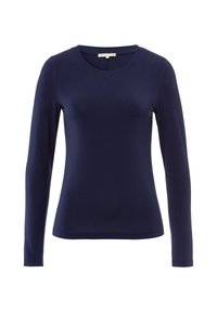 Top long à manches en marine en tissu doux et extensible, avec un col rond et une coupe ajustée. Pas de motifs visibles ni d'accents en métal.