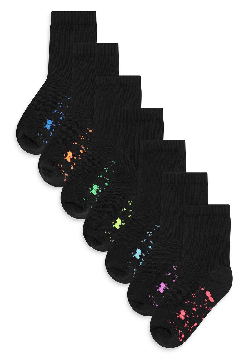 Chaussettes noires ornées de motifs éclaboussés colorés à la pointe dans des nuances de bleu, orange, vert, jaune, teal, rose et violet.