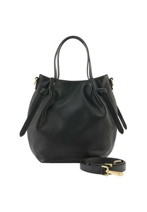 Sac fourre-tout en cuir noir avec doubles poignées, sangles latérales réglables et bandoulière détachable avec quincaillerie dorée, sur fond blanc.