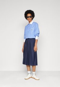 Lacoste Jupe trap?�ze - navy blue/bleu marine - ZALANDO.CH