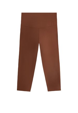 Vyötäröltä korkeavyötäröiset, suoraleikkaiset ja lyhyeksi jäävät ruskeat leggingsit, joissa on sileä vyötärökaitale ilman näkyviä kuvioita tai koristeluja.