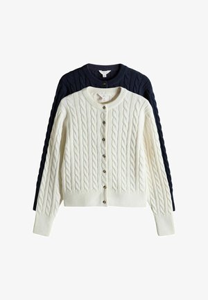 Vestjes met kabelpatroon in crème en marineblauw, met een ronde hals, knoopsluitingen en geribbelde boorden en zoom.