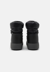Schwarze gepolsterte Knöchelstiefel mit glatter Textur und abgerundetem Schaft. Robuste graue Gummisohle mit leichtem Profil für besten Halt.