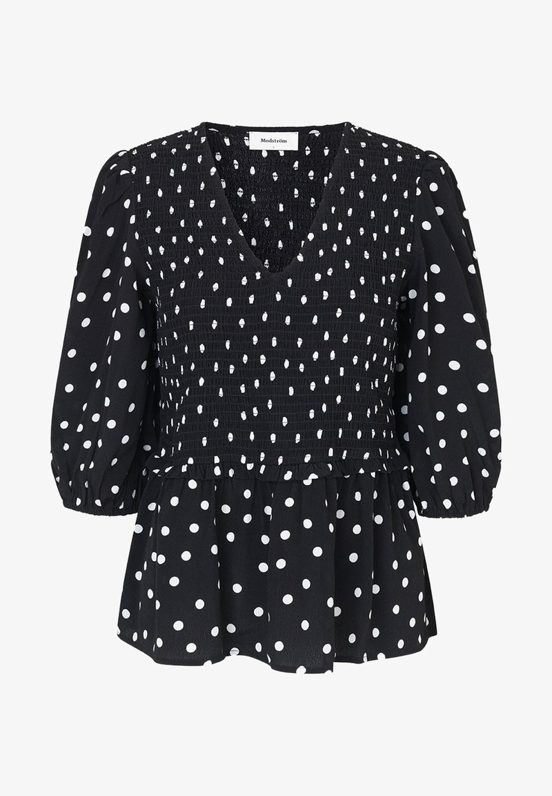 Schwarze Bluse mit weißen Polka-Punkten, mit V-Ausschnitt, gerafftem Oberteil und Puffärmeln. Ausgestellt geschnitten mit texturierten Stoffdetails.