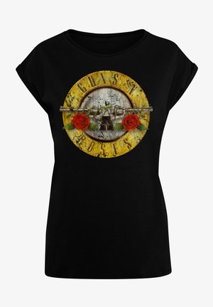 Zwarte katoenen t-shirt met een grafische print van een ronde, verweerde gele-embleem, rode rozen en de tekst "GUNS N' ROSES."