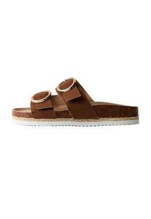Sandale à semelle compensée marron avec deux larges brides ornées de grosses boucles rondes dorées, semelle en liège et semelle extérieure blanche striée.