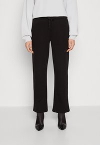 Gina Tricot - BASIC STRAIGHT SWEATPANTS - Jogginghose - black Thumbnail-Bild 1