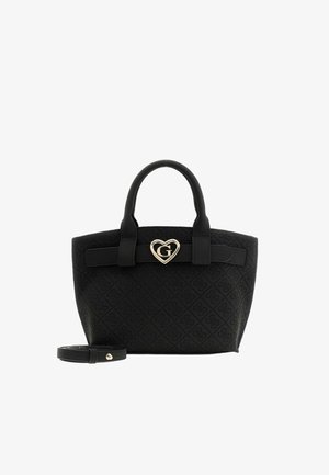 Sac à main noir matelassé avec deux poignées, une sangle amovible à côté et un fermoir doré en forme de cœur avec la lettre G.