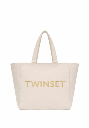 Borsa tote beige con doppi manici, caratterizzata dalla scritta "TWINSET" ricamata in lettere dorate sul davanti.